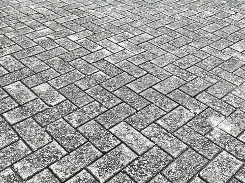Street with herringbone paving block pattern