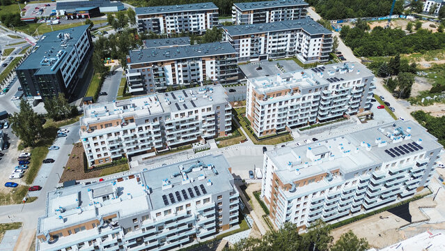 European city modern apartments surrounded by gardens aerial view