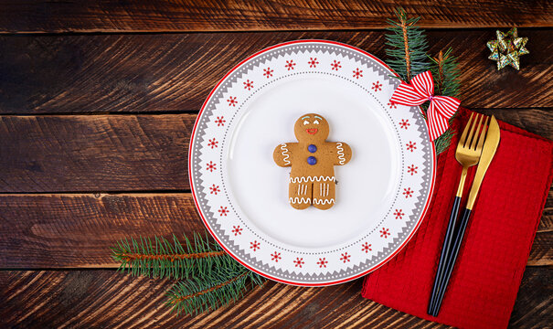 Christmas table setting for celebration design. Holiday celebration.  Kitchen dining table. Winter holiday season. Food decor. Top view,