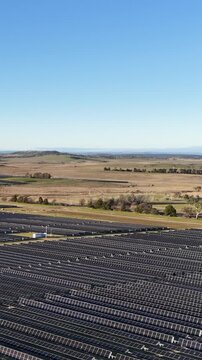 Aerial View of Vast Solar Farm Generating Renewable Clean Energy
