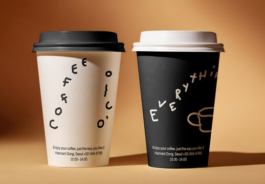 Coffee Cup Mockup PSD With Two Branded Takeaway Cups On Warm Studio Background