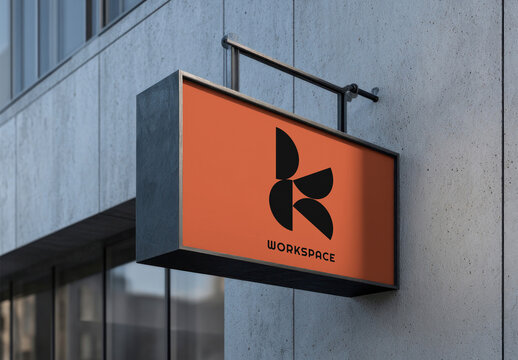Outdoor Signboard Mockup PSD On Modern Building Facade With Orange Branding