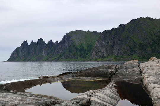 Tungeneset viewpoint between Steinfjord and Ersfjord, seen towards Okshornan and northwest Senja, Norway  