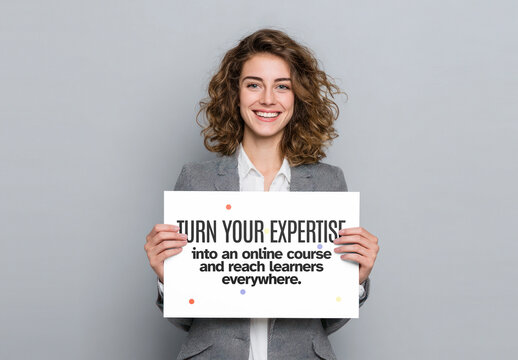 Smiling Caucasian Woman Holding Mockup PSD Sign For Online Course Promo