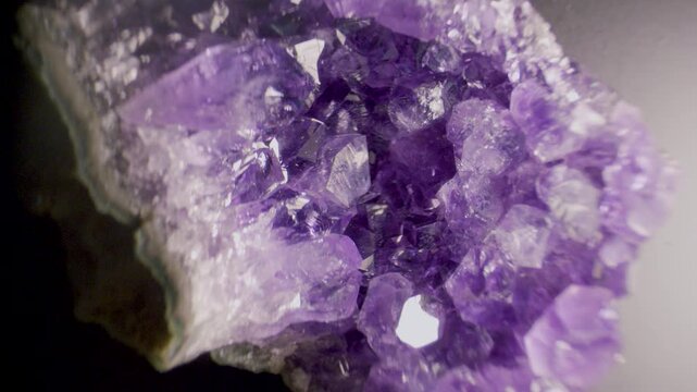 An amethyst geode rotating view under stereo microscope
