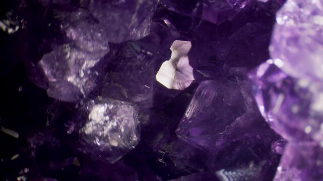 An amethyst geode rotating view under stereo microscope