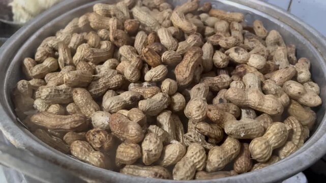 Boiled peanuts texture background close up video