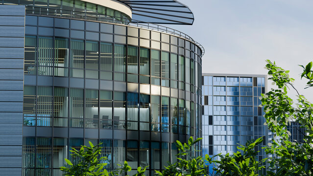 Modern office building with glass facade and conference room interior