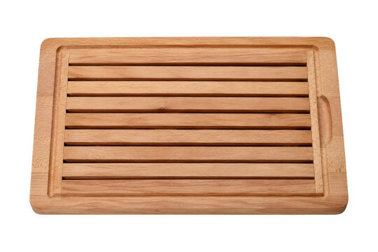 Rectangular light brown wooden breadboard with grooves and a handle, isolated on a clean white background