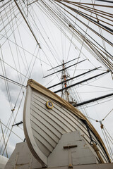 Low angle view of lifeboat and mast rigging on historic sailing vessel © Octavian