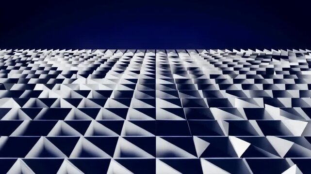 Abstract geometric surface of repeating white triangular forms shifting across a dark blue grid, creating a dynamic wave-like pattern in digital computer animation