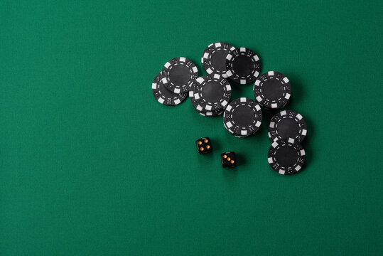 Multicolored casino chips as a conceptual backdrop for gambling games like poker, blackjack
