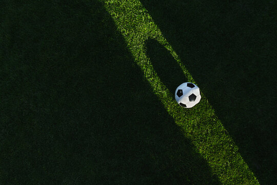  ball on the green field in soccer stadium in sun line. ready for game.
