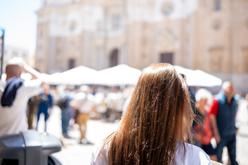Tourist woman exploring Cádiz Cathedral square, enjoying sunny summer vacation trip © Carlos