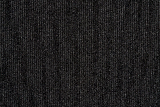 Black ribbed knitted fabric texture background for textile design mockup