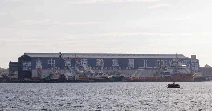Kaohsiung, Taiwan - September 8, 2025: The Jong Shyn Shipbuilding Group shipyard with docked vessels at Kaohsiung Port.