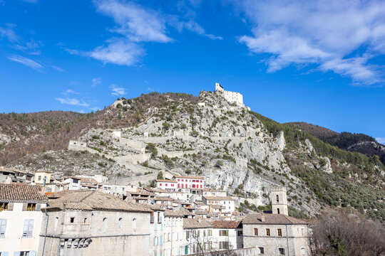The Citadelle d Entrevaux sits atop a rocky hill with fortified walls and zigzag ramps.