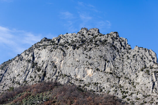 The rugged Clue d Entrevaux limestone cliff dominates the landscape above the old town.