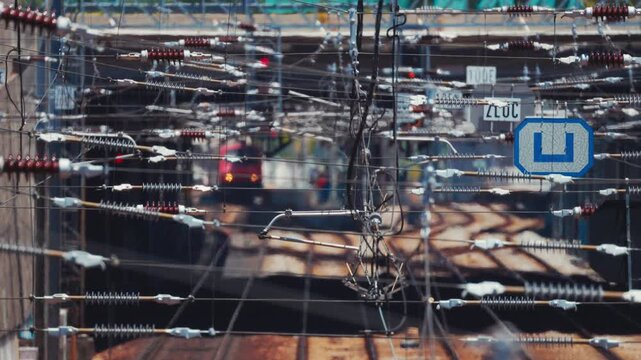 Complex railway overhead power lines and train