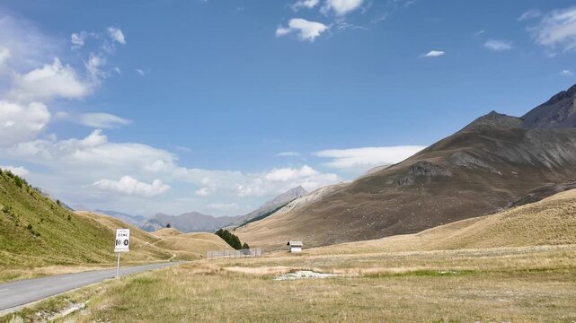 4k footage of the scenic winding the alpine landscapes of colle della maddalena, col de larche, near bersezio, pietraporzio in the maritime alps, piedmont. ideal for travel, nature