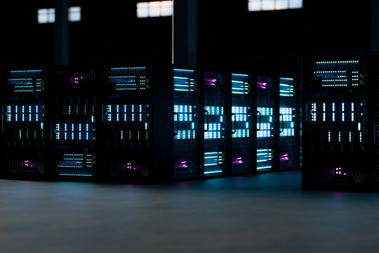3D illuminated server cabinet cluster in modern computing facility