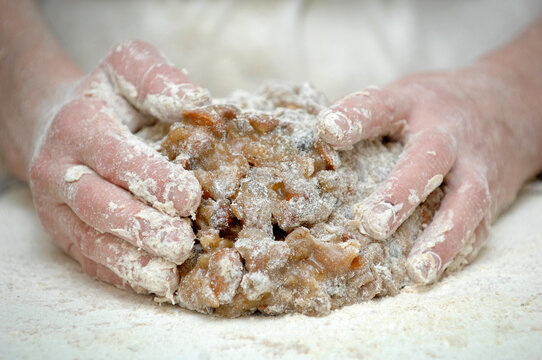 Panforte Margherita di Siena is a typical food from Siena Tuscany Italy. Preparing Panforte in a cake factory in Siena