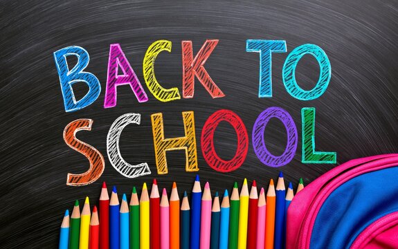 Colorful chalk letters spell "Back to School" on a blackboard
