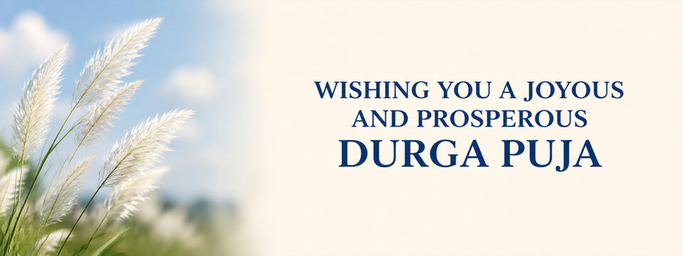 Durga Puja greeting card design featuring white kash grass against a blue sky with festive blessing typography text