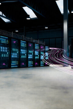 3D fiber optic light trail bending around server racks in data center