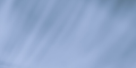 Fototapeta premium Pale blue abstract background with blurred wavy lines