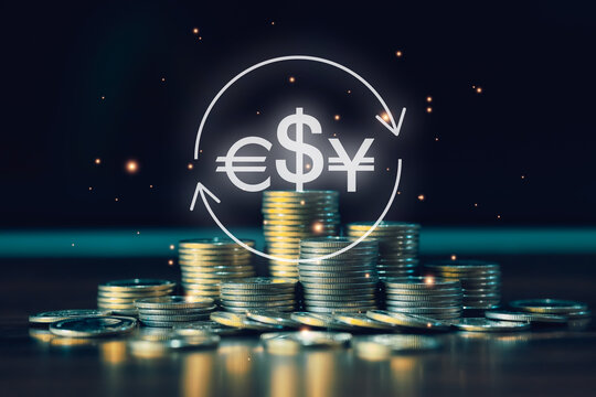 Stacks of coins beneath dollar, euro, and yen currency symbols illustrate foreign exchange, global finance, international investment, currency trading, banking, and economic markets.
