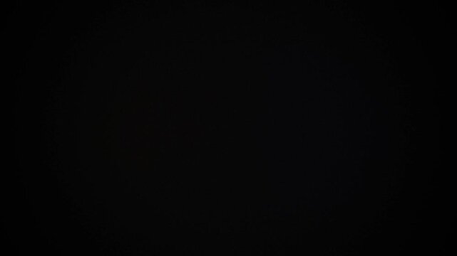 Cinematic grain noise frame with light leak flash overlay
