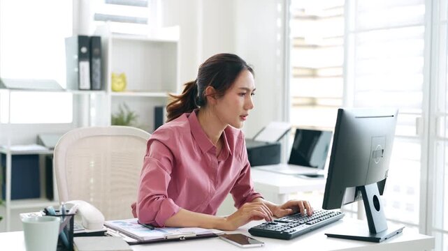 Businesswoman looking shocked while reading bad news on pc computer . Upset woman showing concern and dissatisfied. Worry disappointment and stress.