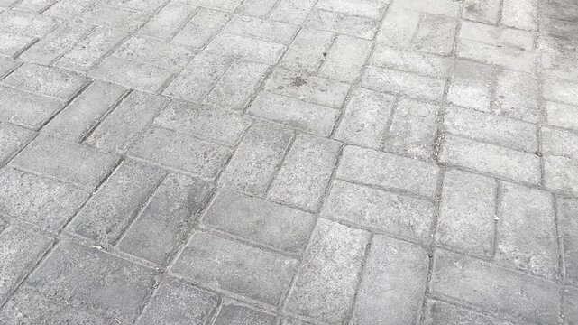 Classic interlocking rectangular paving stones sidewalk texture