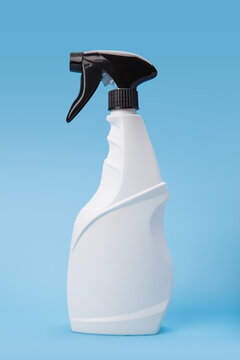White Trigger Spray Bottle on Blue