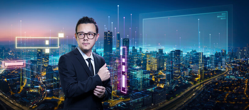 Businessman overlooking smart city network and digital data