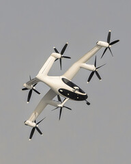 Joby Aviation eVTOL electric air taxi performing a dynamic banking flight maneuver © libin