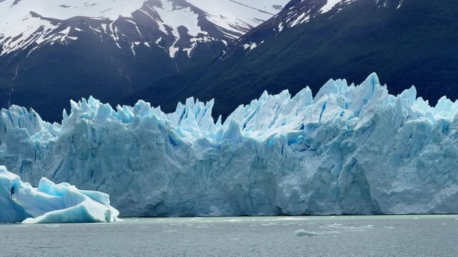 Majestic Perito Moreno Glacier in Los Glaciares National Park. Impressive ice wall with icebergs floating on Lago Argentino, Patagonia