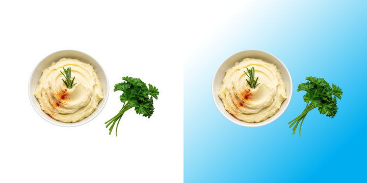 Bowl of creamy mashed potatoes with fresh green parsley garnish top view isolated