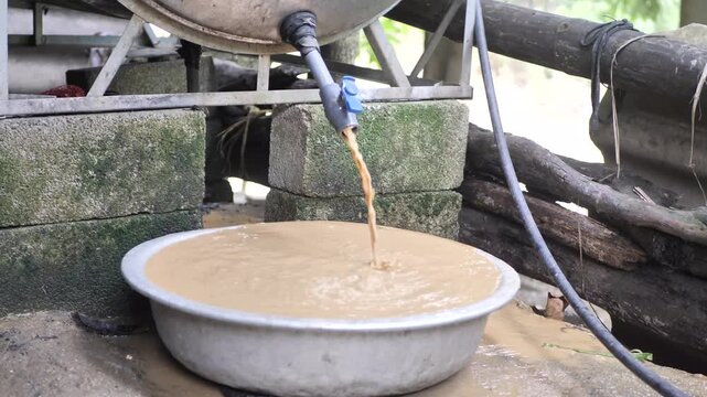 Contaminated dirty tap water flowing dark sediments 
Contaminated, murky, and polluted domestic water
