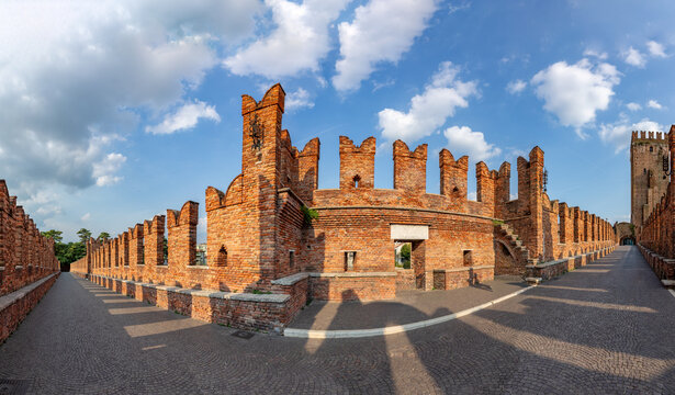 Adige River and fortified  historic Castelvecchio Bridge, also known as the Scaliger Bridge or Ponte Scaligero, Verona,