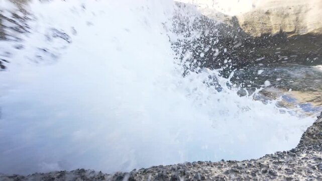 Powerful Sea Water Splashing Toward Camera at Sarakiniko Beach in Milos Greece