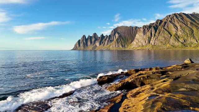 An aerial view of the Tungeneset rest area, situated at the tip of the headland that separates the Steinsfjord and Ersfjord in the Troms&oslash; area, Norway. Beautiful summer weather.