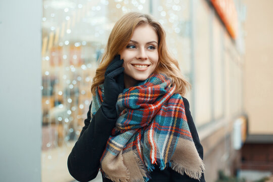 Pretty woman with a sweet smile makes the Christmas shopping