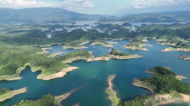 Aerial view of Ta Dung Lake with green islands in Dak Nong, central Vietnam.