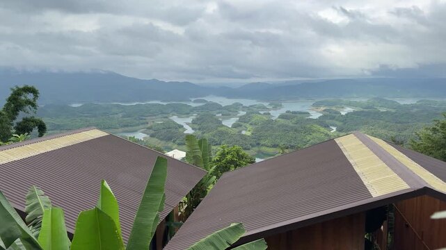 Panoramic view of Ta Dung Lake with green hills in Dak Nong, central Vietnam.