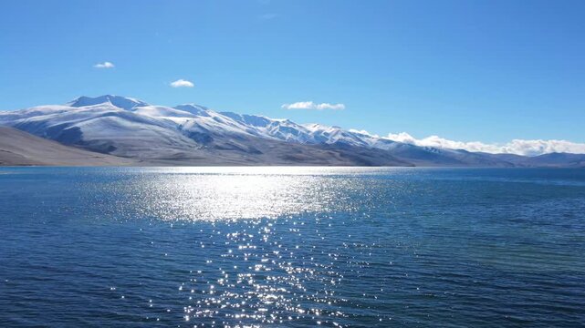 Tso Moriri, a stunning, high altitude blue lake surrounded by snow capped mountains in Ladakh