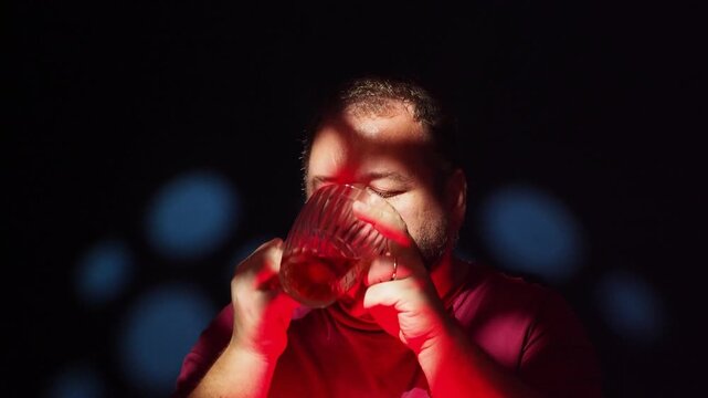 Sad  man lonely in pub drinking beer.