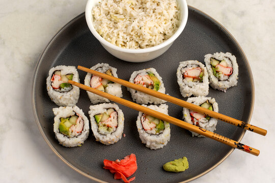 california rolls served with a side pf rice