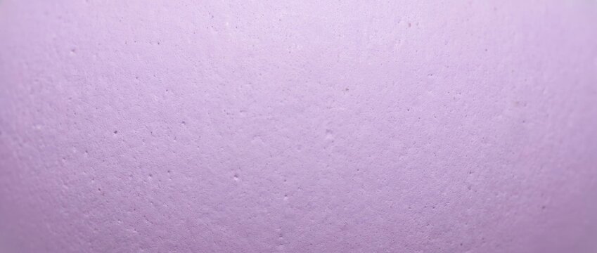 Lavender Easter egg shell texture macro. Light purple dyed eggshell surface background with copy space for text